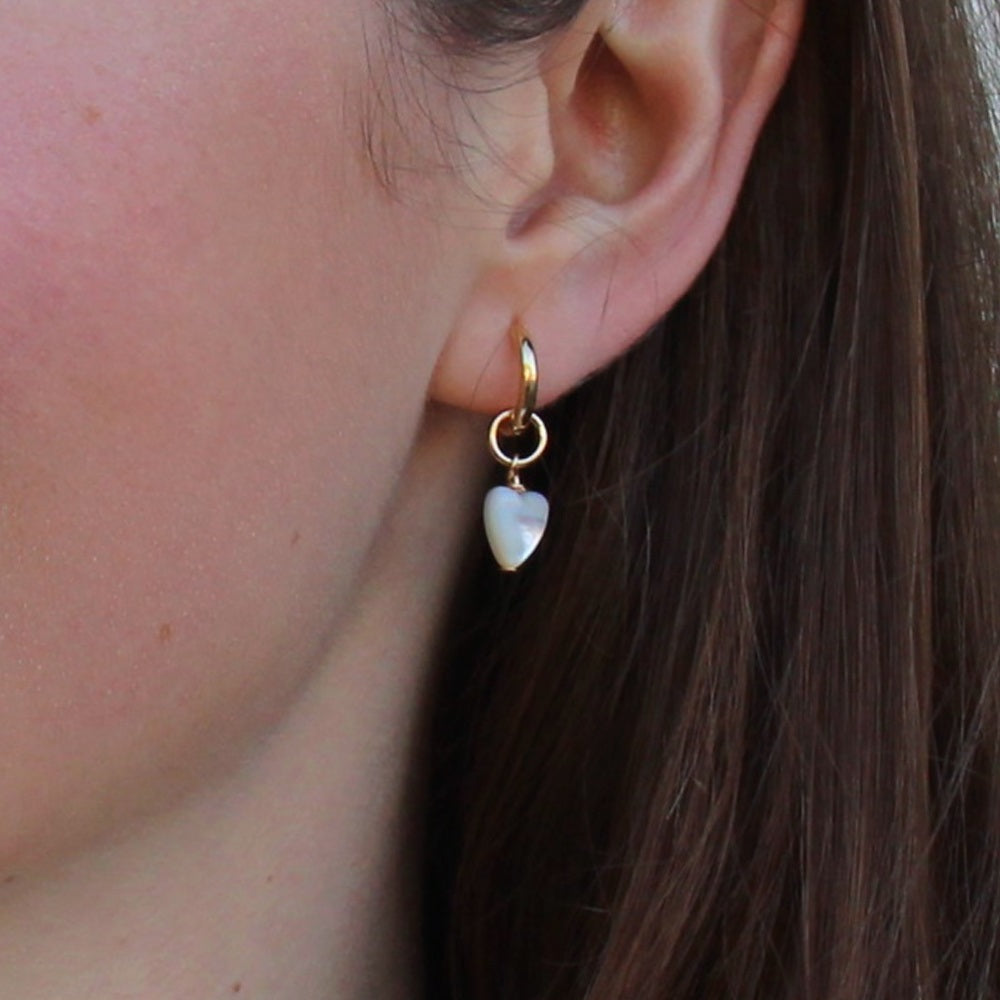 mother-of-pearl-heart-charm-and-gold-huggie-hoop-earrings